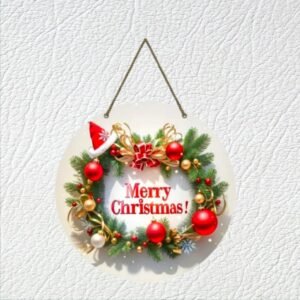 Round wooden Christmas wall hanging featuring a printed green wreath with red ornaments, gold ribbon, and a Santa hat with text "Merry Christmas!" hanging on a white wall.