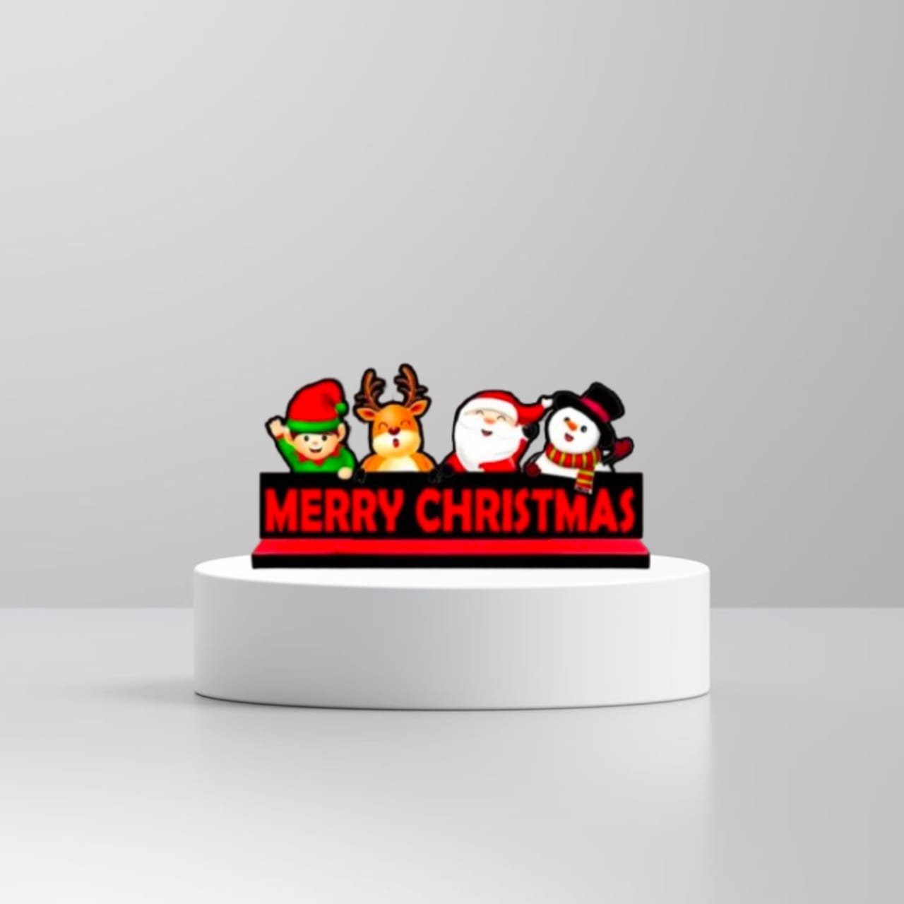 merry-christmas-tabletop-decoration-santa-reindeer-standee.jpg Merry Christmas tabletop sign with cute Santa, Snowman, Elf and Reindeer cartoon characters on a red and black base.