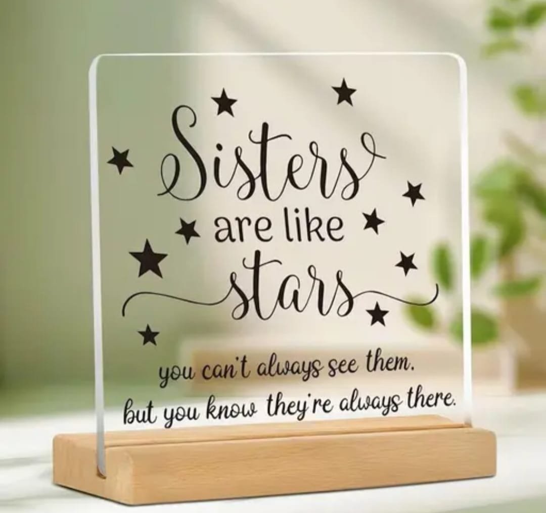 Sisters Are Like Stars Gift Lifestyle Sisters Are Like Stars Gift placed on a wooden table next to books.