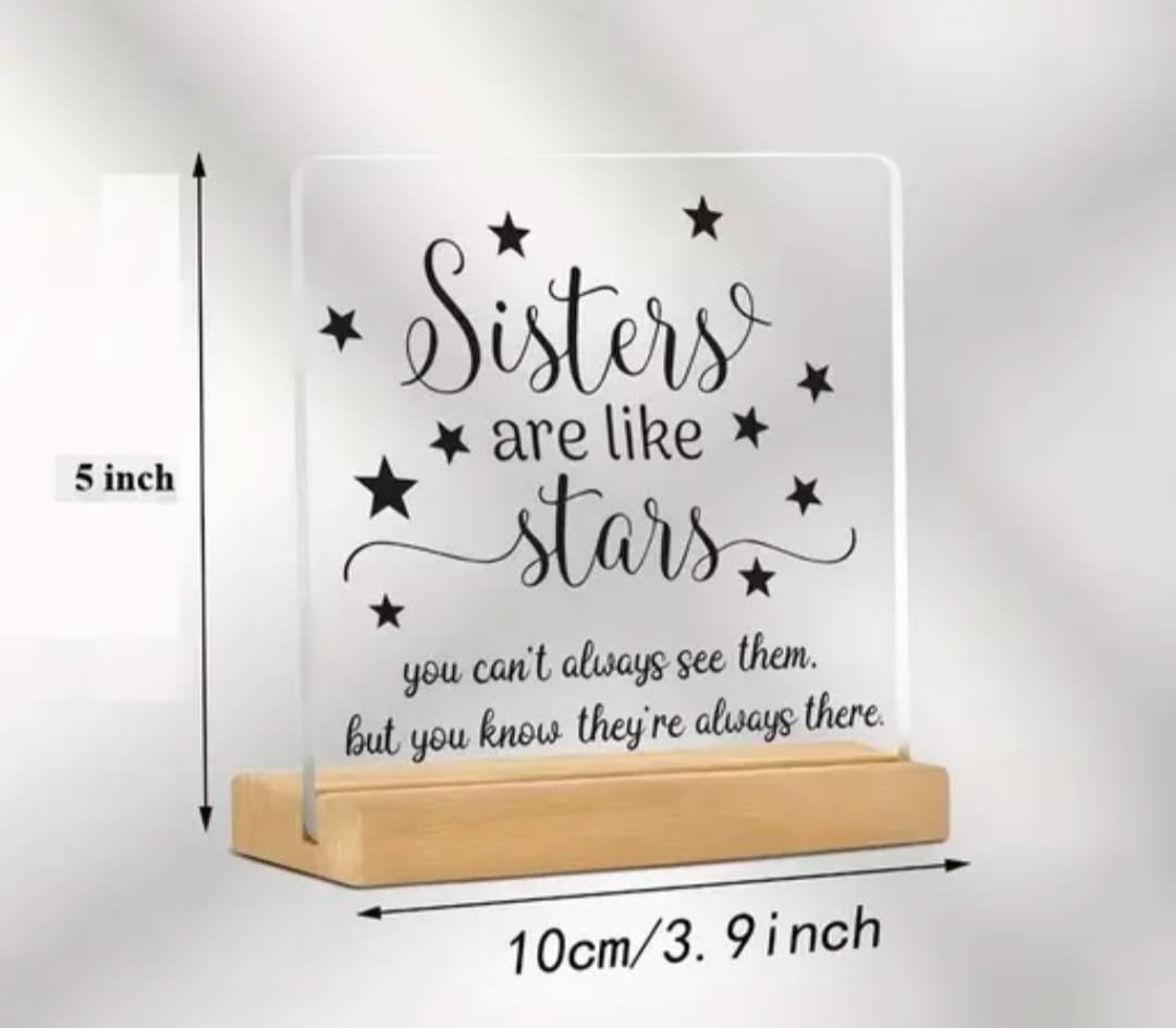 Sisters Are Like Stars Gift Lifestyle Sisters Are Like Stars Gift placed on a wooden table next to books.